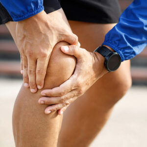 Runner's knee pain at the running track Grapevine, TX
